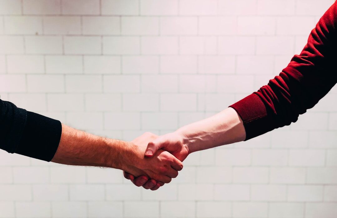 famous actors shaking hands