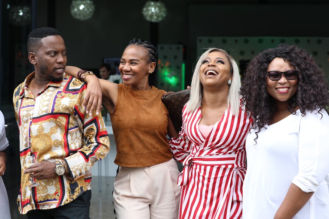 group of celebrities laughing